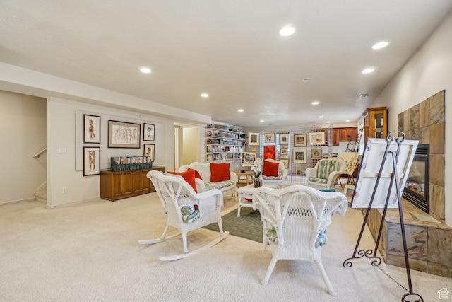 4538 Cottage Grove Ln, Murray, UT 84107 - living area featuring light colored carpet, recessed lighting, stairs, a tile fireplace, and baseboards