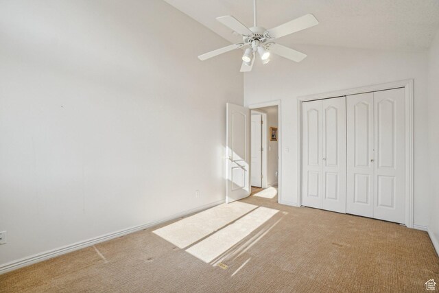 4538 Cottage Grove Ln, Murray, UT 84107 - unfurnished bedroom with carpet flooring, a closet, high vaulted ceiling, a ceiling fan, and baseboards