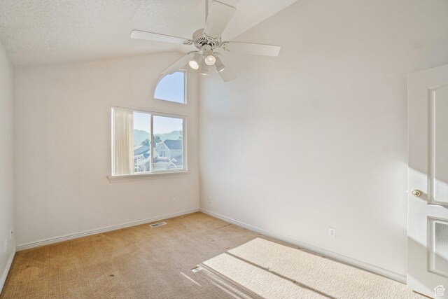 4538 Cottage Grove Ln, Murray, UT 84107 - empty room featuring a ceiling fan, light carpet, baseboards, and vaulted ceiling