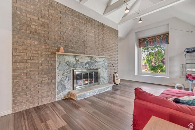 1789 N Stayner Dr W, Farmington, UT 84025 - living area with a large fireplace, baseboards, and wood finished floors