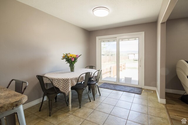 113 E 1500 N, Vernal, UT 84078 - dining room featuring baseboards and light tile patterned flooring