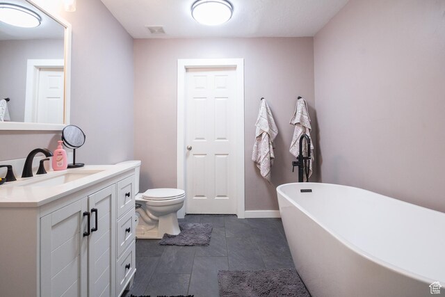 113 E 1500 N, Vernal, UT 84078 - bathroom with a freestanding bath, vanity, and toilet