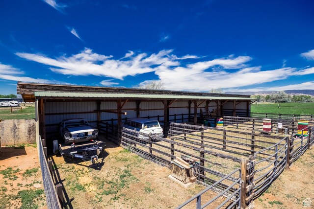 113 E 1500 N, Vernal, UT 84078 - view of outdoor structure featuring an exterior structure, a carport, and a view of countryside