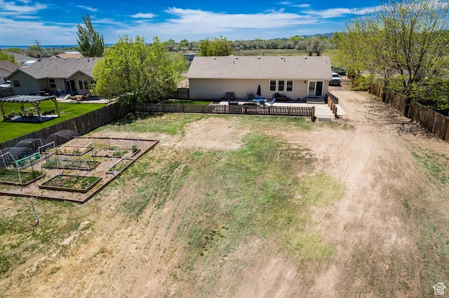 113 E 1500 N, Vernal, UT 84078 - back of property with a garden and a wooden deck