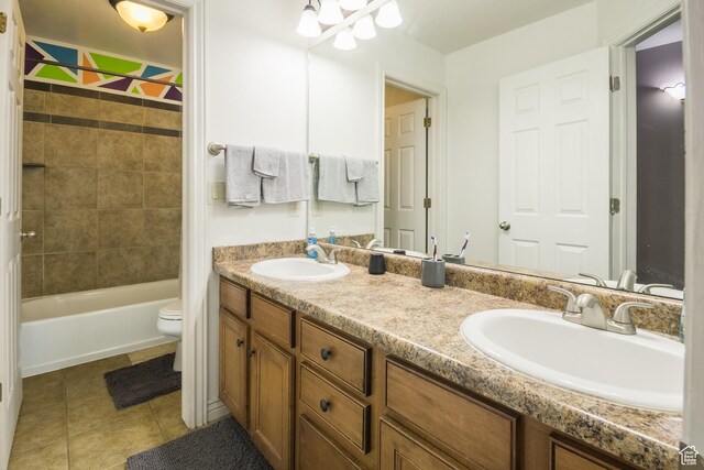 113 E 1500 N, Vernal, UT 84078 - full bathroom featuring double vanity, tile patterned floors, toilet, and bathtub / shower combination