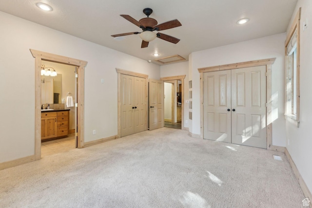 280 N Mill Rd, Heber City, UT 84032 - unfurnished bedroom featuring light carpet, baseboards, multiple closets, ensuite bathroom, and recessed lighting