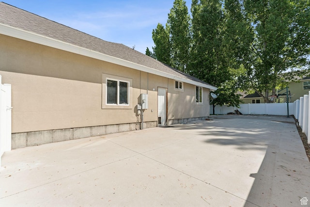 280 N Mill Rd, Heber City, UT 84032 - view of side of property featuring a patio area and roof with shingles