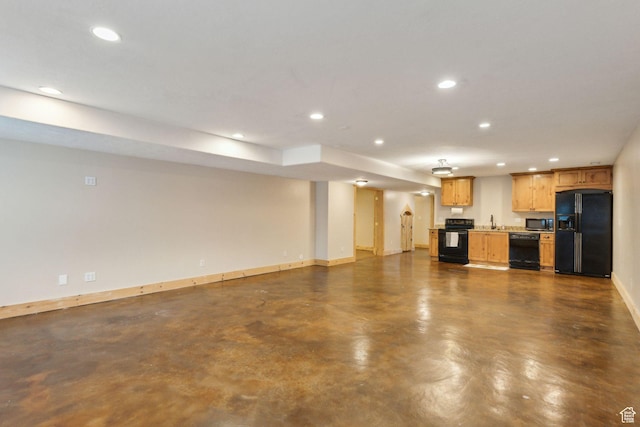 280 N Mill Rd, Heber City, UT 84032 - unfurnished living room with recessed lighting, a sink, baseboards, and finished concrete floors
