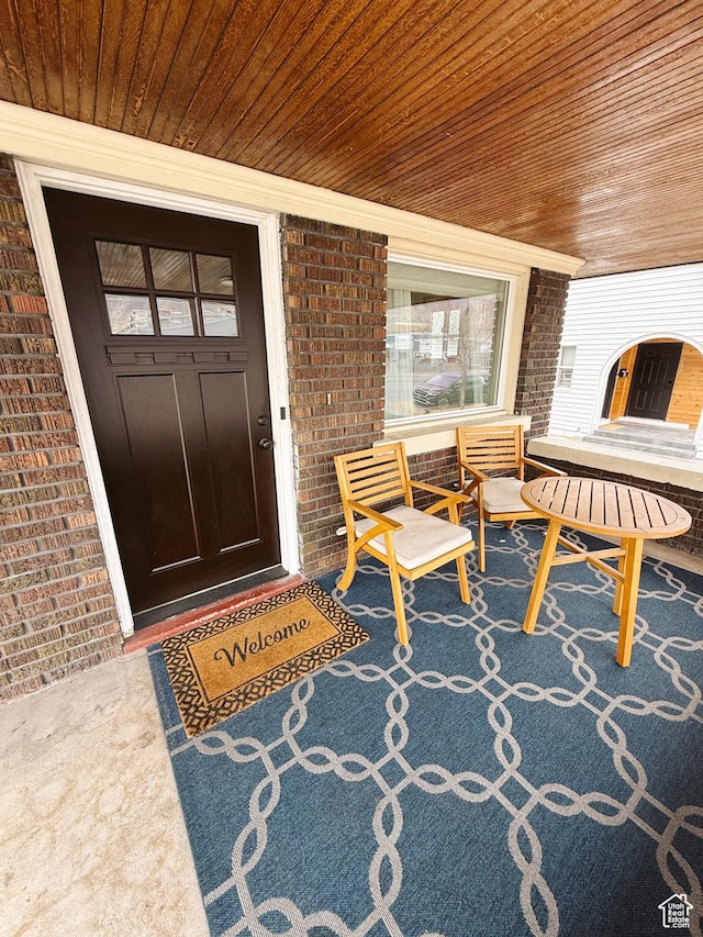 292 S 100 W, Provo, UT 84601 - property entrance featuring brick siding and a porch