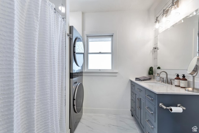 292 S 100 W, Provo, UT 84601 - full bathroom with stacked washing machine and dryer, vanity, marble finish floors, baseboards, and curtained shower