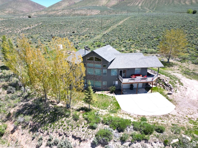 1940 E Shore Rd, Saint Charles, ID 83272 - aerial view of property and surrounding area with mountains