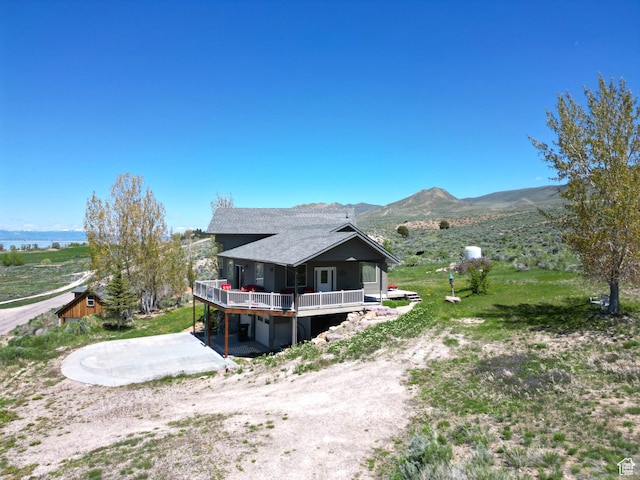 1940 E Shore Rd, Saint Charles, ID 83272 - view of property exterior featuring a deck with mountain view