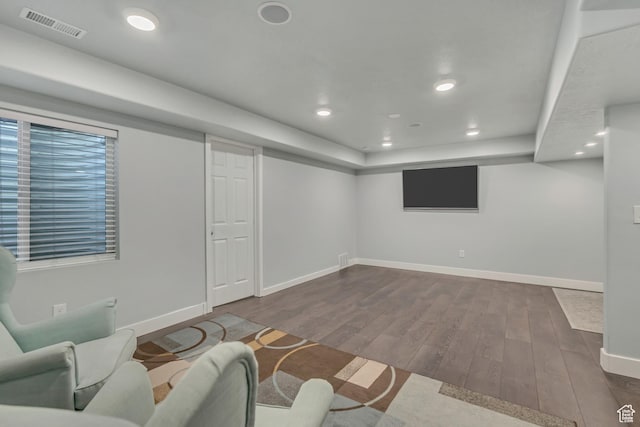 5058 W Blythswood Ln S, Herriman, UT 84096 - finished below grade area featuring dark wood-style floors, baseboards, and recessed lighting