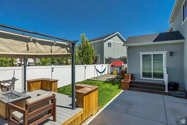 5058 W Blythswood Ln S, Herriman, UT 84096 - view of patio with a fire pit, a pergola, a wooden deck, and a hot tub