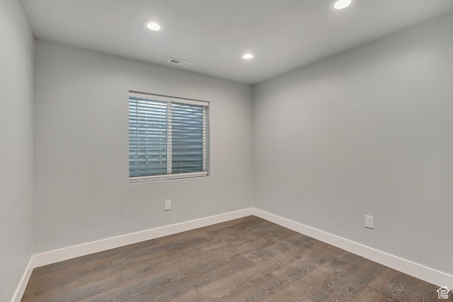 5058 W Blythswood Ln S, Herriman, UT 84096 - empty room featuring recessed lighting, baseboards, and dark wood finished floors