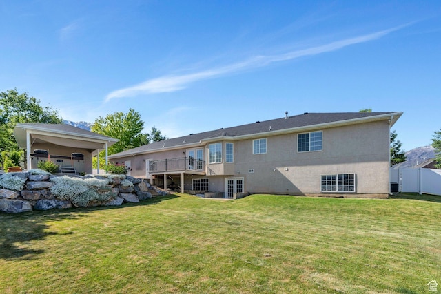 69 E Hudson Dr, Elk Ridge, UT 84651 - rear view of property with stucco siding and a deck