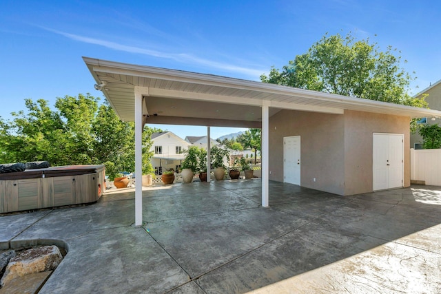 69 E Hudson Dr, Elk Ridge, UT 84651 - view of patio with a hot tub