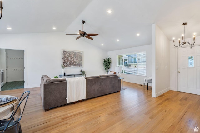 69 E Hudson Dr, Elk Ridge, UT 84651 - living room featuring a chandelier, plenty of natural light, light wood-type flooring, vaulted ceiling, and ceiling fan
