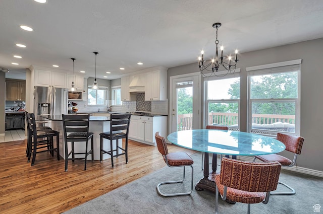 1995 E 6225 S, South Ogden, UT 84403 - dining space with light wood-style flooring, a chandelier, and recessed lighting
