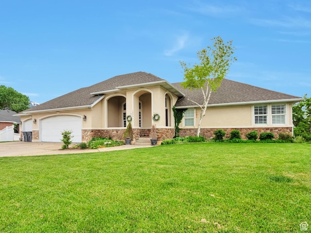1995 E 6225 S, South Ogden, UT 84403 - view of front facade with stone siding, stucco siding, driveway, and an attached garage