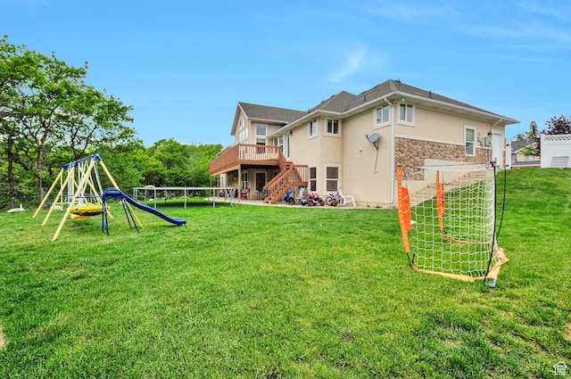1995 E 6225 S, South Ogden, UT 84403 - back of house with stucco siding, stone siding, stairs, a deck, and a playground