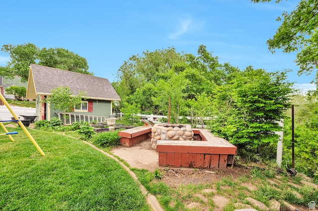 1995 E 6225 S, South Ogden, UT 84403 - view of grassy yard with an outbuilding and a deck
