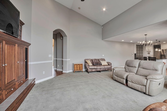 1995 E 6225 S, South Ogden, UT 84403 - carpeted living room featuring high vaulted ceiling, arched walkways, a chandelier, and recessed lighting