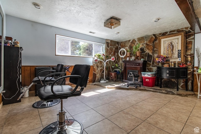 628 N Sir Philip Dr, Salt Lake City, UT 84116 - tiled living area with a textured ceiling and wainscoting