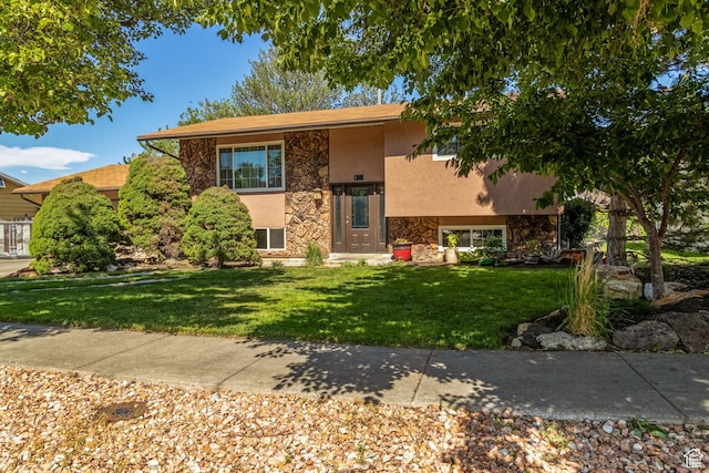 628 N Sir Philip Dr, Salt Lake City, UT 84116 - split foyer home with stone siding, stucco siding, and a front lawn