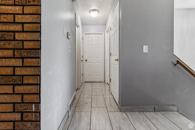 628 N Sir Philip Dr, Salt Lake City, UT 84116 - hall featuring baseboards and light wood finished floors