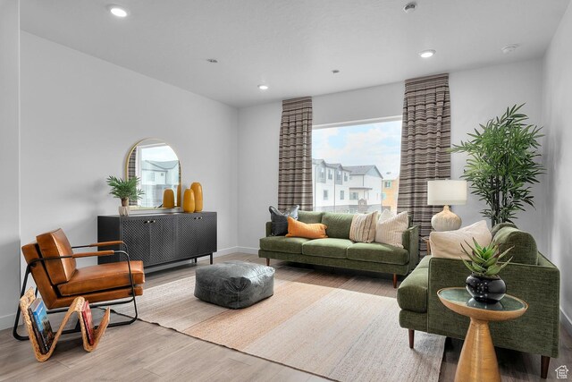 412 S 1110 W Unit 215, American Fork, UT 84003 - living room featuring plenty of natural light, wood finished floors, recessed lighting, and baseboards