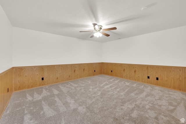 888 S 1000 E, Orem, UT 84097 - carpeted spare room with a ceiling fan, a wainscoted wall, and wood walls