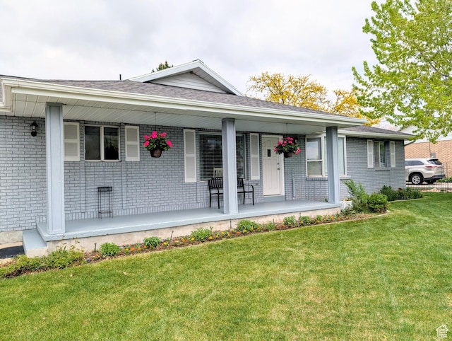 897 E 1200 N, Mapleton, UT 84664 - ranch-style home with brick siding, a front lawn, covered porch, and a shingled roof