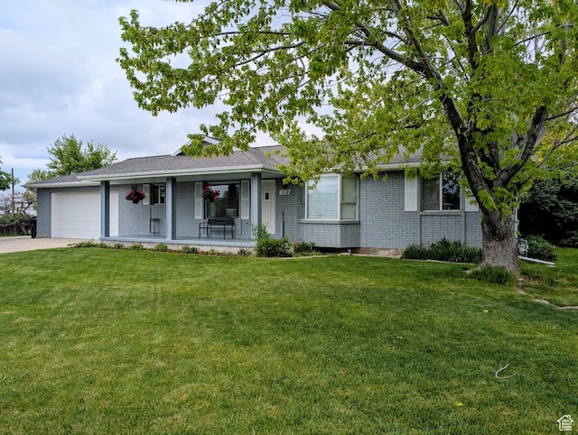 897 E 1200 N, Mapleton, UT 84664 - single story home featuring an attached garage, covered porch, a front lawn, driveway, and brick siding