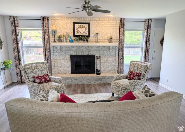 897 E 1200 N, Mapleton, UT 84664 - living room with baseboards, ceiling fan, a fireplace, and wood finished floors