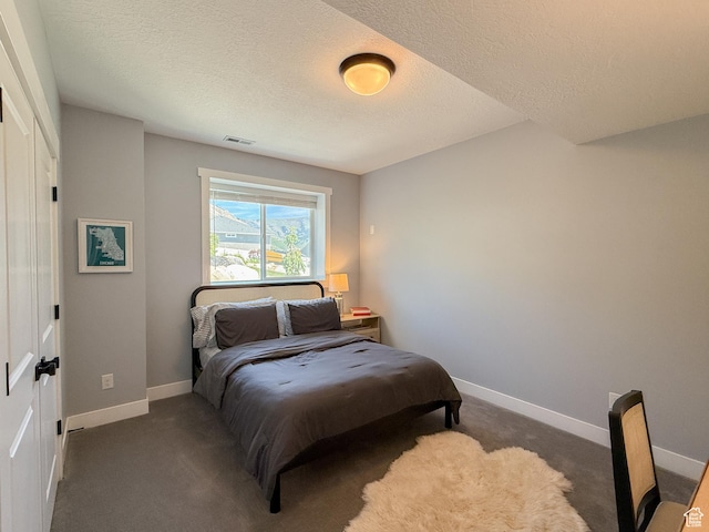 3723 N 500 E, North Ogden, UT 84414 - carpeted bedroom with baseboards and a textured ceiling