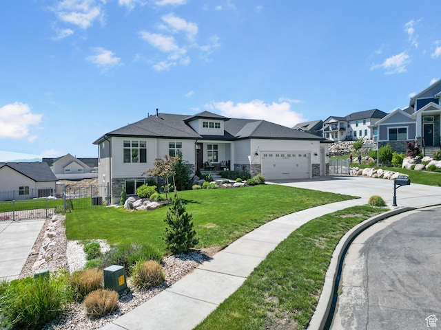 3723 N 500 E, North Ogden, UT 84414 - view of front of home featuring a residential view, stone siding, a garage, and driveway