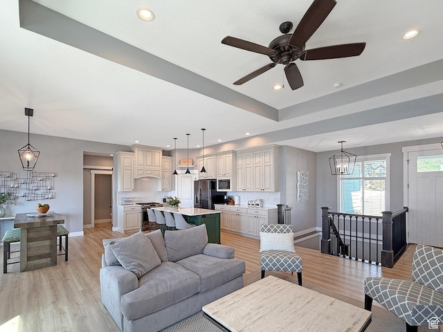 3723 N 500 E, North Ogden, UT 84414 - living room with light wood finished floors, ceiling fan, baseboards, and recessed lighting