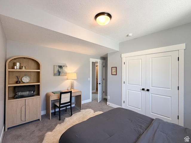 3723 N 500 E, North Ogden, UT 84414 - bedroom featuring light colored carpet, baseboards, a closet, and a textured ceiling
