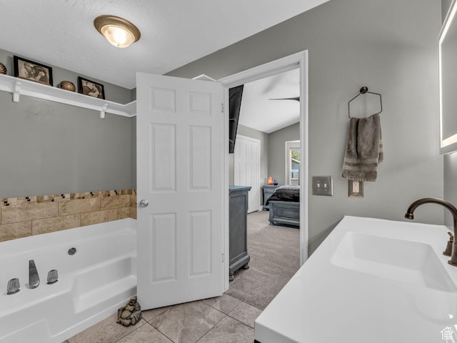 10685 S Superior Cir E, Sandy, UT 84094 - bathroom with a bath, ensuite bathroom, and vanity