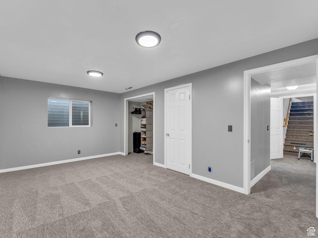 10685 S Superior Cir E, Sandy, UT 84094 - finished below grade area featuring carpet, stairs, and baseboards