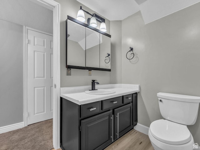 10685 S Superior Cir E, Sandy, UT 84094 - bathroom with vanity, toilet, and baseboards
