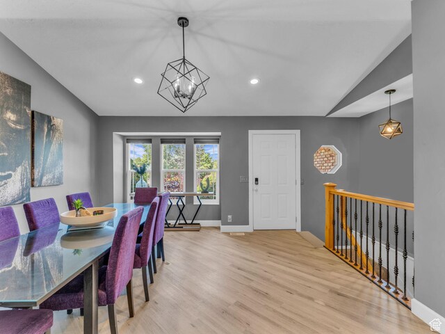10685 S Superior Cir E, Sandy, UT 84094 - dining room with light wood-style floors, lofted ceiling, a chandelier, baseboards, and recessed lighting