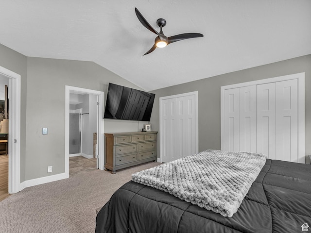 10685 S Superior Cir E, Sandy, UT 84094 - bedroom with lofted ceiling, two closets, light carpet, baseboards, and ceiling fan