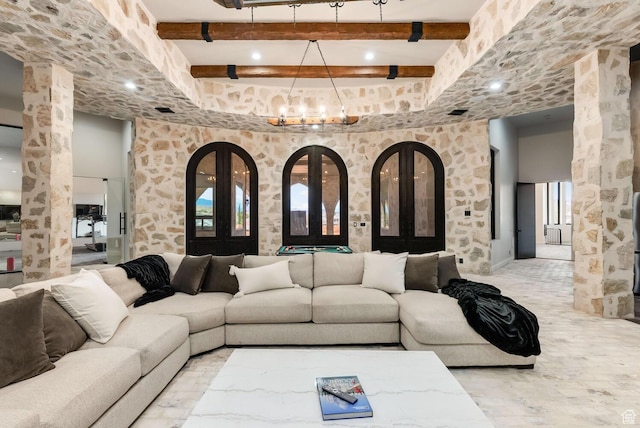 2836 S 2300th Cir E, St George, UT 84790 - living area with beam ceiling, a chandelier, and ornate columns