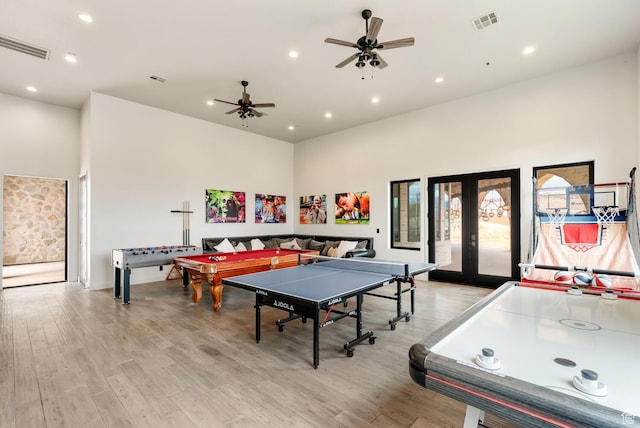 2836 S 2300th Cir E, St George, UT 84790 - playroom featuring light wood-style flooring, ceiling fan, recessed lighting, a towering ceiling, and french doors