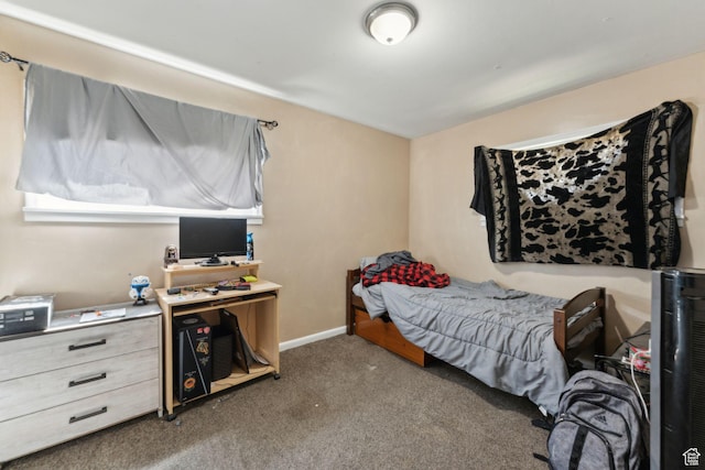 717 9th St, Ogden, UT 84404 - carpeted bedroom featuring baseboards
