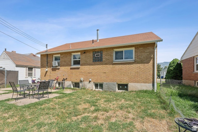 717 9th St, Ogden, UT 84404 - rear view of property featuring a patio area and brick siding