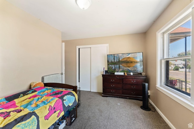 717 9th St, Ogden, UT 84404 - bedroom featuring carpet and a closet