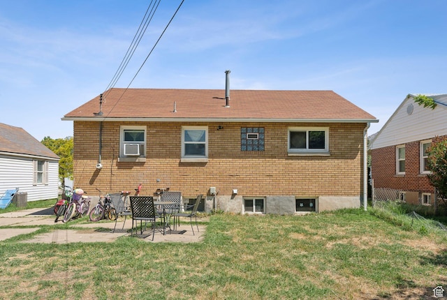 717 9th St, Ogden, UT 84404 - rear view of property featuring a lawn, a patio, and roof with shingles